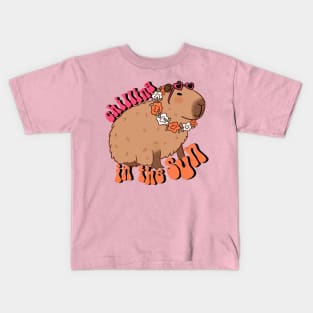 Chilling in the sun a fun capybara ready for summer vacation Kids T-Shirt